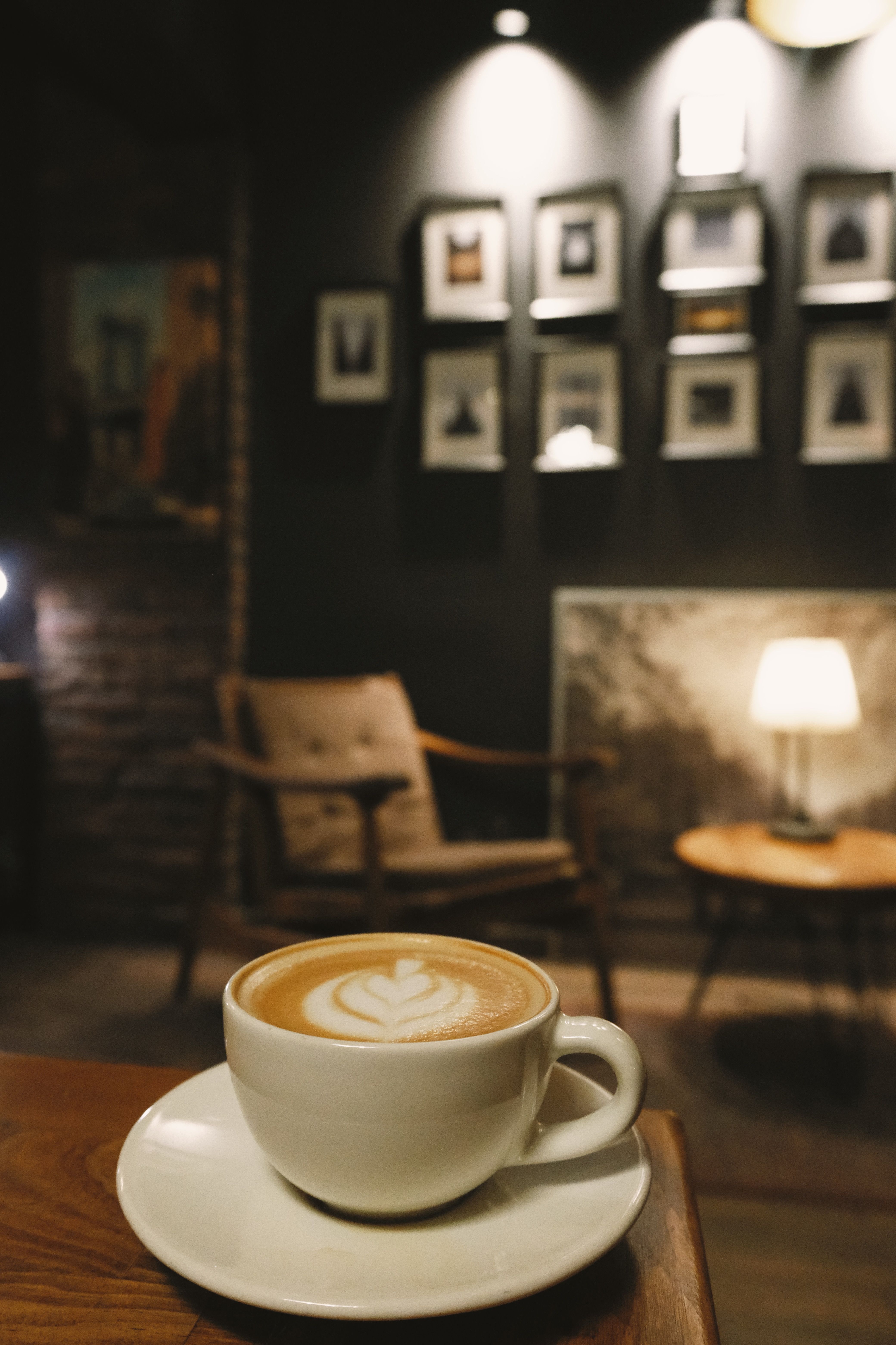 Warm cozy coffee shop interior with latte art